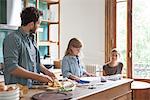 Family spending time together in kitchen