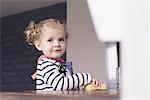 Little girl helping with housework, portrait