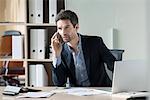 Businessman making important phone call