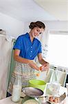 Woman baking in kitchen