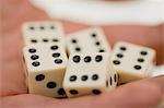 Close up of woman holding dice