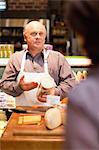 Man with free samples in grocery store