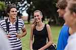 Friends talking in park