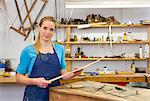 Carpenter working in shop