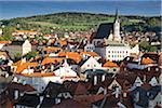 Overview of city and rooftops with St Vitus Church, Cesky Krumlov, Czech Republic.