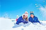 Siblings playing in snow, Chamonix, France