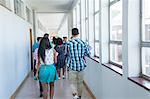 Students walking down hallway