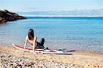 Female surfer on beach