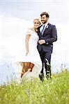 Bride and groom standing side by side