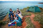 Group of friends at campsite celebrating