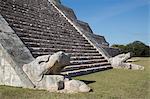 Serpent heads, El Castillo (Pyramid of Kulkulcan), Chichen Itza, UNESCO World Heritage Site, Yucatan, Mexico, North America