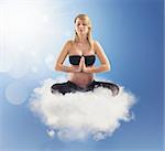 Pregnant woman doing yoga on a cloud