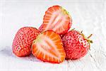 strawberries on white wooden background