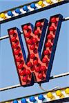 classic electric sign like the ones used in circus or old fashioned shops representing the W letter