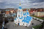 Tyumen, Russia - April 19, 2015: View at city quarters with Znamensky Cathedral from helicopter