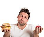 Man choosing between healthy food and unhealthy