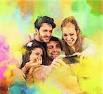 Smiling friends taking a colorful party photo