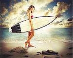 Girl with surfboard walking on the beach