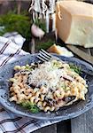 Spaghetti pasta with porcini and parmesan cheese