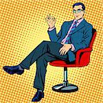 Businessman sitting in an armchair gesture okay pop art retro style