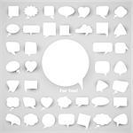 collection of white chat bubbles of various shapes on a light background