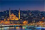 Image of Istanbul with Yeni Cami Mosque during twilight blue hour.