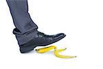 man walking on banana on white background