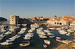 Old Town waterfront harbour area and city walls, Dubrovnik, UNESCO World Heritage, Dalmatia, Croatia, Adriatic, Europe