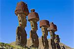 Anakena beach, monolithic giant stone Moai statues of Ahu Nau Nau, four of which have topknots, Rapa Nui (Easter Island), UNESCO World Heritage Site, Chile, South America