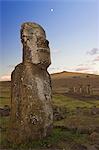 Lone monolithic giant stone Moai statue at Tongariki, Rapa Nui (Easter Island), UNESCO World Heritage Site, Chile, South America