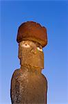 Moai statue Ahu Ko Te riku, the only topknotted and eyeballed Moai on the Island, illuminated at sunrise, Rapa Nui (Easter Island), UNESCO World Heritage Site, Chile, South America