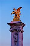 Gilded sculpture of Fame restraining Pegasus, Alexandre III Bridge, Paris, France, Europe