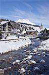 River and village church Lech, near St. Anton am Arlberg in winter snow, Austrian Alps, Austria, Europe