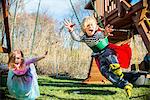 Children in costumes playing outdoors
