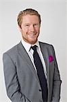 Portrait of man wearing suit, studio shot