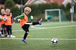 Boy playing football