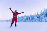 Smiling woman with outstretched arms