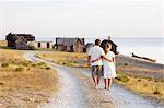 Couple walking at sea