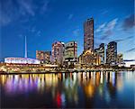 Melbourne Southbank skyline, Eureka Tower, the 2nd tallest building in Australia and Hamer Hall over the Yarra River at twilight, viewed from Princes Bridge, Melbourne, Victoria, Australia.