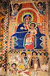 Ethiopia, Abraha Atsbeha, Tigray Region. The interior of the semi monolithic 10th century church of Abraha Atsbeha is richly adorned with post 17th century paintings depicting biblical scenes.