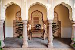 India, Rajasthan, Jaipur.  An attractive veranda at the Samode Haveli, a historic 175 years old mansion which has been converted into a luxury hotel.