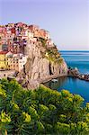 Manarola, Cinque Terre, Liguria, Italy. Sunset over the town, view from a vantage point