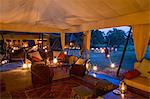 Kenya, Mara North Conservancy. The magical mess tent in Elephant Pepper Camp in the evening light.