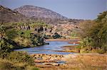 Kenya, Shaba National Reserve. An elephant crosses the Ewaso Ngiro river.