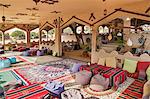 Oman, Wahiba Sands. An attractive Bedouin style sitting area at a desert camp in Wahiba Sands.