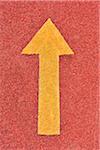 Yellow Arrow on Red Road, Brisbane, Queensland, Australia