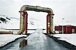 Peculiar pipework built over the road, Krafla Power Station, is the largest Geothermal power station in Iceland, Polar Regions