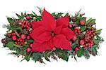 Thanksgiving and christmas poinsettia flower display with red baubles, holly, winter greenery and red bauble decorations over white background.
