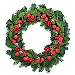 Christmas wreath with red bauble decorations, holly, ivy, mistletoe and winter greenery over white background.