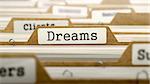 Dreams Concept. Word on Folder Register of Card Index. Selective Focus.